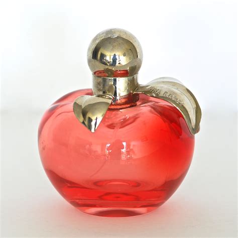 perfume with apple shaped bottle.